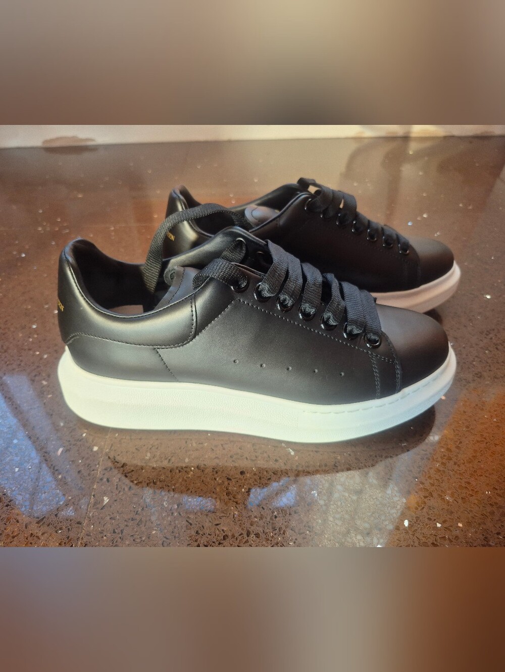 Authenic Alexander McQueen Black Leather Low-Top Sneakers with White Soles